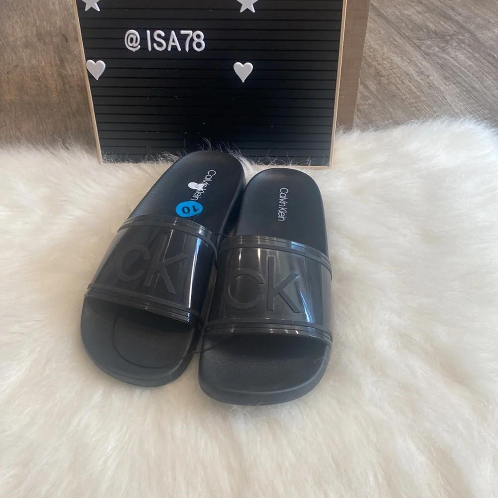 Calvin Klein Women's Austin Translucent Jelly Logo Pool Slides.